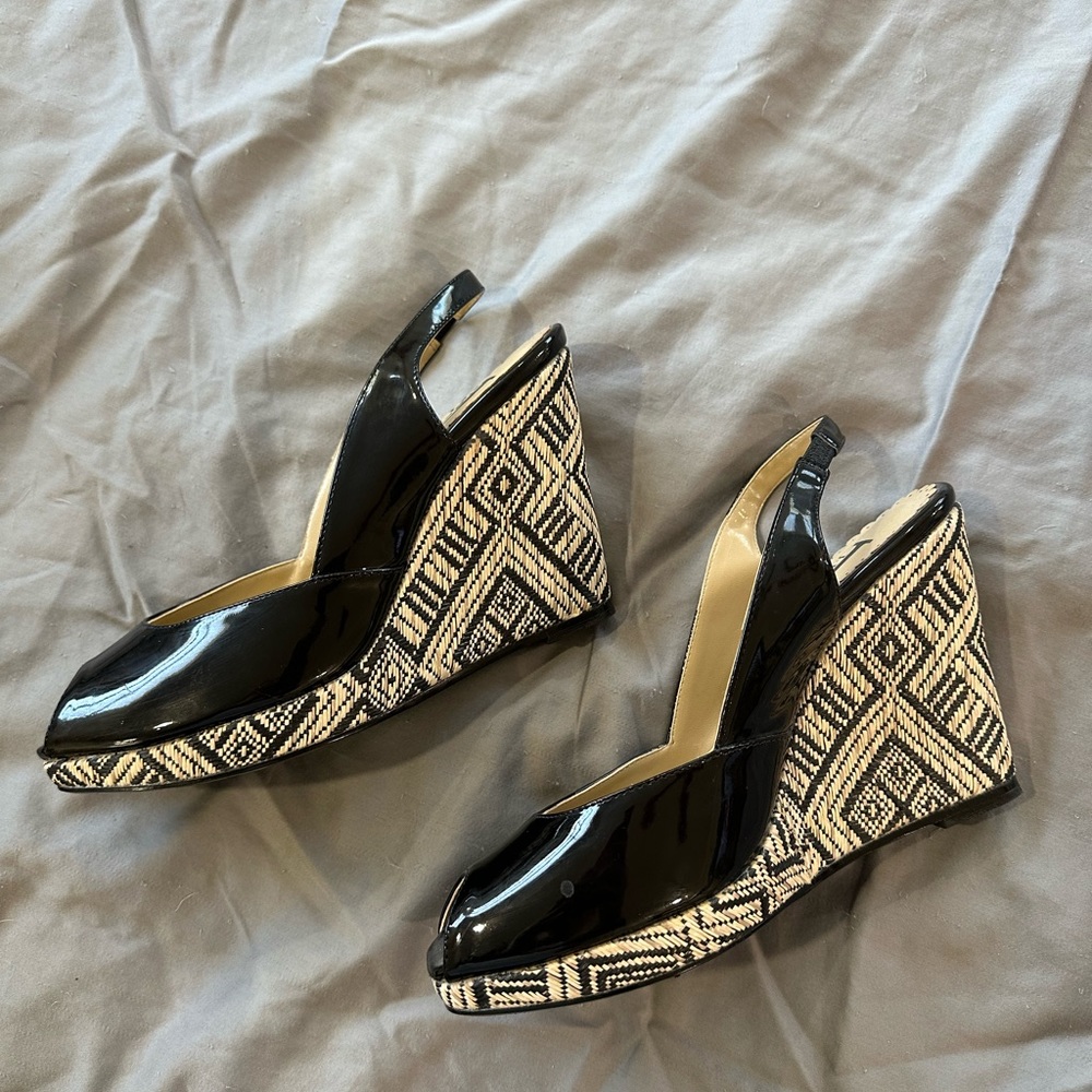 Black and tan open toe wedge heels